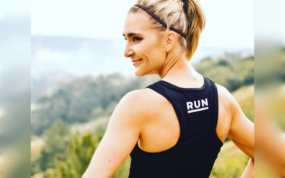 Marissa Groenewald skips her way from South Africa's Pietermaritzburg to Durban on Sunday during the Comrades Marathon.