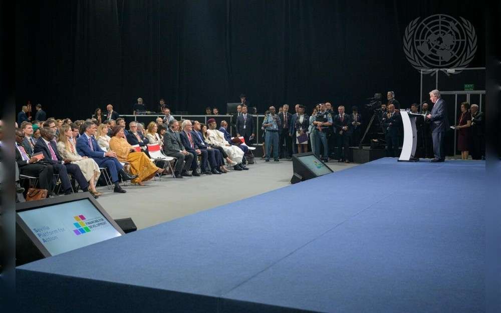 United Nations Secretary-General António Guterres (at podium at right) addresses the launch of the Sevilla Platform for Action during the 4th International Conference on Financing for Development (FfD4).