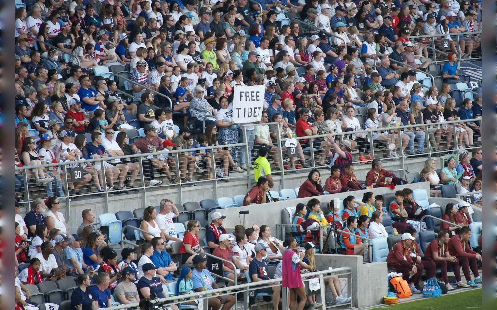 Tibetan activists protested for a “Free Tibet” during a women’s soccer friendly between the United States and China at the weekend — and won the support of other spectators who booed when they were briefly evicted from their seats by security.