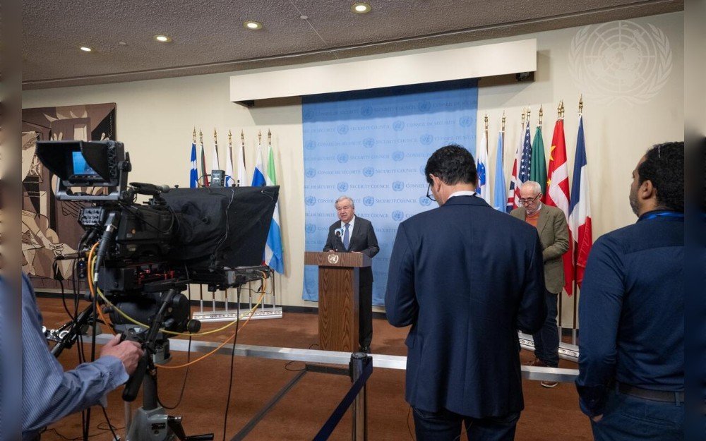 United Nations Secretary-General António Guterres (at podium) briefs reporters on the situation in Gaza. At second from right is Stéphane Dujarric, Spokesperson for the Secretary-General on