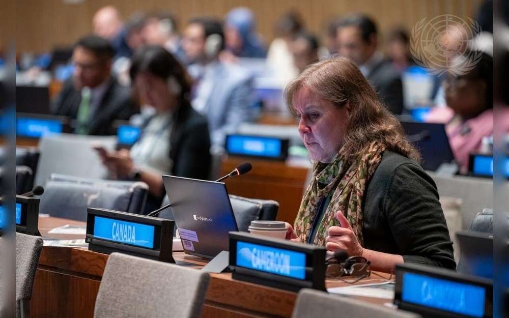 A representative of Canada addresses a meeting of the 21st session of the United Nations Forum on Forests.