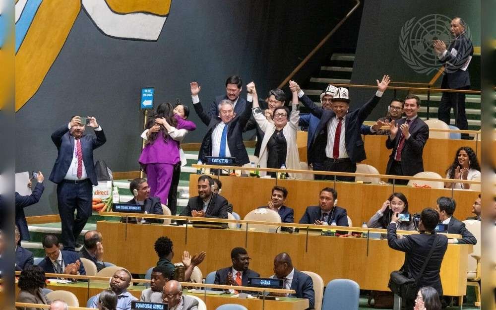 The delegation of Kyrgyzstan celebrates being elected as non-permanent members of the United Nations Security Council for the term 2027-2028 during the 86th plenary meeting of the UN General Assembly.