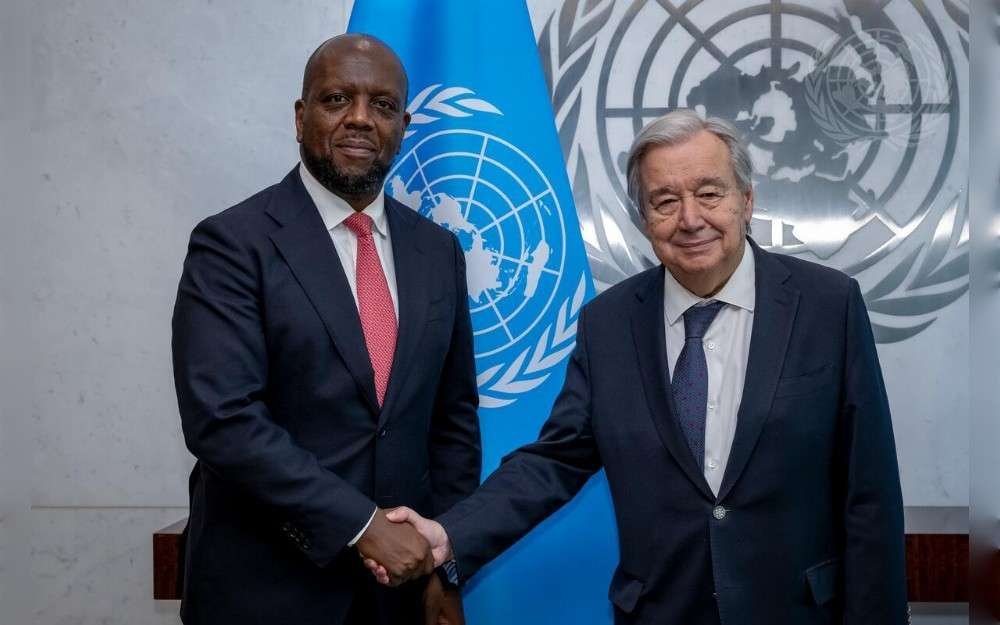 United Nations Secretary-General António Guterres (right) meets with Martin Kimani, Assistant Secretary-General for Africa in the Departments of Political and Peacebuilding Affairs and Peace Operations.